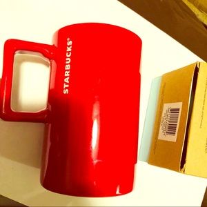 Two Starbucks mugs